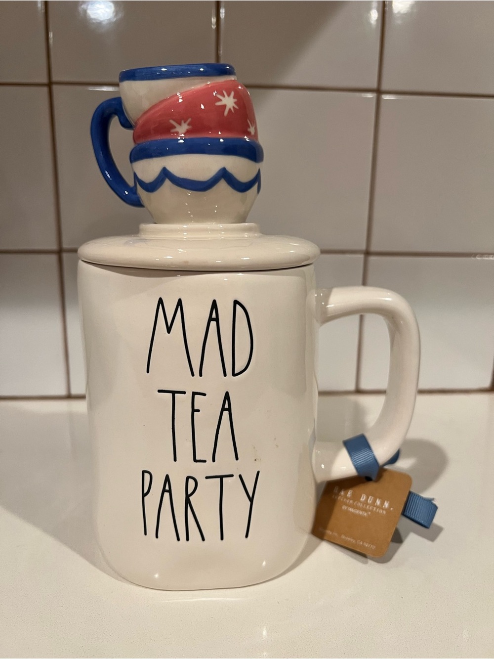 Rae Dunn Disney White Ceramic Mug with Blue and Pink Stacked Teacup Lid NWT